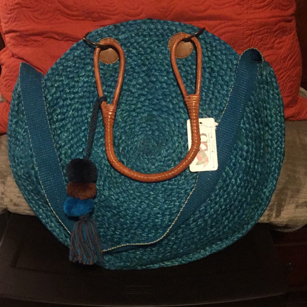 Teal woven circle bag
